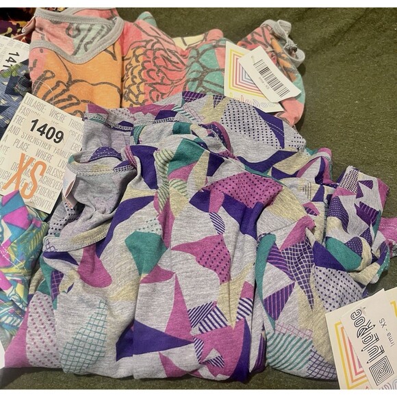 Lularoe Bundle Lot Of 8 Size XS Irma Tops Shirts NWT New Disney - Picture 4 of 5